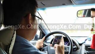 Hành Khách Ngồi Ghế Trước Có Bị Cấm Dùng Điện Thoại Không?